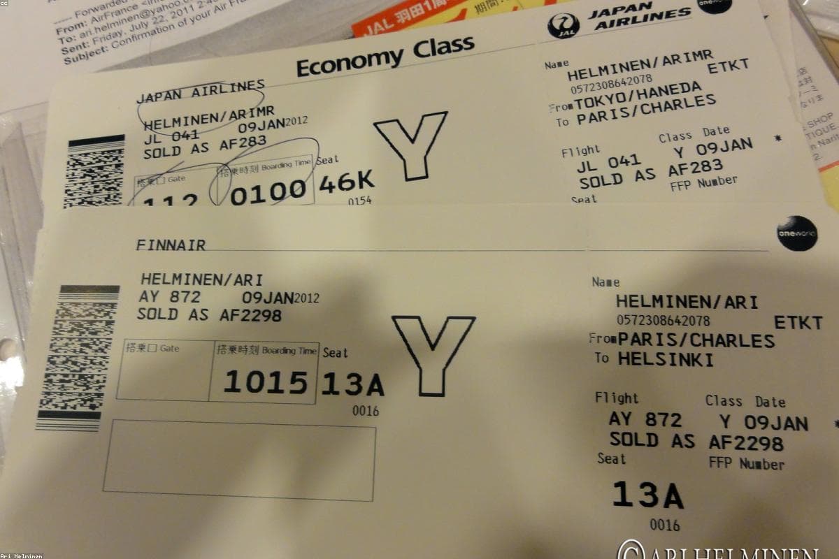 Travelers preparing for vacation with luggage and phone connectivity